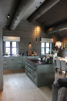 the kitchen is clean and ready to be used as a dining room or living room