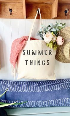 The SUMMER THINGS over sized canvas tote bag is perfect minimalist bag for a trip to the beach!  Available with text in several colors... check out the variations!  This bag is made from 100% thick, sturdy canvas. AVAILABLE IN TWO SIZES * Large - 19.5" x 13" with a 4" gusset *Jumbo - 23" x 13" with a 6" gusset   These bags are hand painted using non-toxic fabric paint.  The technique used creates an attractive distressed appearance to the text that varies from bag to bag.  All of my products are Large Capacity Canvas Bag For Summer Vacation, Large Capacity Canvas Bag For Spring Beach Outings, Casual Summer Canvas Shopping Bag, Casual Summer Canvas Bag For Shopping, Casual Canvas Bag For Summer Shopping, Summer Vacation Beige Canvas Bag, Large Capacity Summer Canvas Tote Bag, Large Capacity Summer Canvas Bag, Trendy Summer Canvas Bag For Daily Use