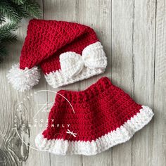 a crocheted santa hat and diaper cover