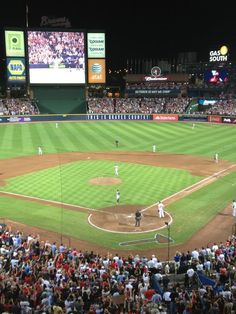 a baseball game in progress with the batter up to plate ready for the pitcher and umpire