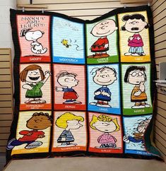 a blanket with many cartoon characters on it