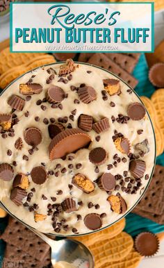 a peanut butter fluff dessert in a bowl with chocolate chips and graham crackers