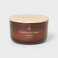 Fill your space with the warm essence of sandalwood and smoke using the 3-Wick Amber Glass Wooden Wick Sandalwood and Smoke Jar Candle 20oz from Threshold™. Housed in a sleek amber glass jar, this 20oz candle comes with three crackling wooden wicks that emit the vibe of a relaxing fireplace. The soy and paraffin wax blend offers approximately 51 hours of burn time, making this candle ideal for cozying up your evenings and setting an inviting mood. Threshold™: Looks like home, feels like you. Wooden Wick Candles, Cozy Candles, Amber Glass Jars, Wood Candle, Glass Jar Candles, Candle Flames, Wooden Wick, Wood Candles, Tin Candles