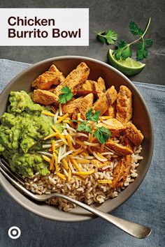 chicken burrito bowl with rice, guacamole and cilantro sauce