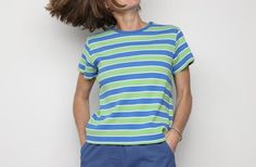 Women's striped shirtSize Medium listed***Across chest - 18.5 inchesLength - 22 inches***Good condition!z33 Fitted Casual T-shirt With Contrast Stripes, Fitted Short Sleeve Tops With Horizontal Stripes, Fitted Horizontal Stripe Short Sleeve Tops, Fitted Striped Short Sleeve T-shirt, Casual Short Sleeve T-shirt With Vertical Stripes, Green Short Sleeve Tops With Horizontal Stripes, Fitted Striped Sporty T-shirt, Sporty Fitted Striped T-shirt, Green Horizontal Stripe Summer Top