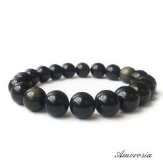 Obsidian bracelet #gemstone #astrology #summer #wealth #energy #green #sea #ocean #jewelry #crystal #obsidian #bracelet #armband #bracciale Round Obsidian Meditation Bracelets, Handmade Black Obsidian Beaded Bracelets, Wealth Energy, Crystal Obsidian, Golden Obsidian, Obsidian Bracelet, Sheen Obsidian, Ocean Jewelry, Jewelry Crystal