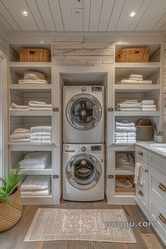 a washer and dryer in a room with lots of linens on the shelves