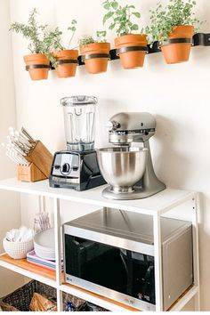 an industrial farm co kitchen shelf with plants and appliances on it, along with the words industrial farm co