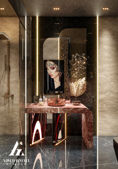 a bathroom with a marble counter top and gold accents on the walls, along with a large mirror