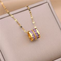 This Crystal Elegance Necklace is an exquisite work of art! Whether you prefer pink, purple, or white, this stunning '18k Gold Plated' necklace will dazzle and delight with its shine and sparkle! Shine like a diamond and grab one today! Material: 18K Gold Plated over Stainless Steel. Finished with anti-tarnish processing (allergic skin safe + nickel and lead-free). Does not tarnish. Lucky Charm Necklace, Wedding Party Accessories, نظارات شمسية, Round Pendant Necklace, Long Pendant Necklace, Geometric Jewelry, Crystal Necklace Pendant, Round Pendant, Stainless Steel Necklace