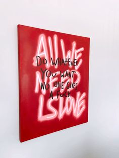 a red painting with white writing on it that says do whatever you want, no one gives at all else