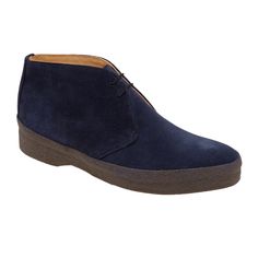 Navy Blue Suede Chukka Boot with rubber sole.    Fully leather lined  Hard-wearing but soft premium crepe sole  Suede calf uppers      These are one of the most comfortable boots to wear that you can buy ina relaxed fit that will accommodate average to wider feet. The sole unit is crepe rubber which givs you the extreme comfort. The 'high top' side protects the suede from scuffs, mud and accidental knocks.  Fully leather lined and with suede calf uppers, this is a proper boot, built to last and Suede Chukka Boots, Suede Chukkas, Swimwear Suits, Chukka Boot, Shoes And Boots, Daniel Craig, Comfortable Boots, Steve Mcqueen, Hi Top