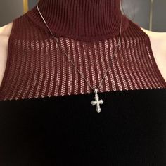 This vintage mini cross necklace adds a touch of timeless elegance to any outfit. Crafted with intricate detail, it exudes sophistication and sophistication. This necklace is a must-have for those seeking a touch of luxury in their accessories. Elevate your style with this exclusive piece. Features: -Brand: WIC -Style: Original design -Material: Silver+ruby -Color: Silver Pink -Size: 5.6MM -Weight: About 4G - Whether to wear a pendant: Yes Elegant Pendant Cross Necklace With Clavicle Chain, Elegant Cross Pendant Necklace With Clavicle Chain, Elegant Sterling Silver Cross Necklace For Formal Occasions, Elegant Sterling Silver Cross Necklace, Elegant Clavicle Chain Jewelry With Cross Pendant, Elegant Clavicle Chain With Cross Pendant Jewelry, Elegant Silver Cross Pendant Necklace, Elegant Silver Necklace With Cross Pendant, Elegant Clavicle Chain With Cross Pendant