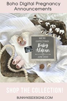 a basket filled with baby items on top of a white blanket and text that reads shop the