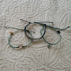 These Are Three Individual Pura Vida Bracelets That Will Be Sold Together. They're Brand New, I Just Cannot Wear Them On The Regular, And They Deserve To Be Taken Out On The Town. They're Adjustable And Durable! Casual Gray Bracelet, Casual Light Blue Everyday Jewelry, Adjustable Gray Jewelry, Casual Gray Bracelets For Everyday, Casual Adjustable Gray Jewelry, Casual Adjustable Light Blue Jewelry, Casual Handmade Gray Jewelry, Casual Gray Bracelet Jewelry, Jewelry Pura Vida