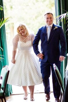 a man and woman in wedding attire walking down a hall way with the caption maddal belle