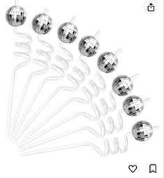 a bunch of mirrors hanging from the side of a wall next to each other on a white background