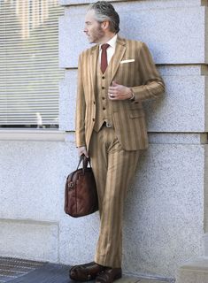 When you look good, you feel good, and that's exactly what happens when you don our Italian Ildefo Brown Wool Suit. This modern take on vintage style is crafted from pure merino wool, ensuring the perfect outfit for any special occasion. Additionally, the wide brown stripes add a touch of sophistication, drawing attention to what you're saying rather than what you're wearing.  Look features a 2 button jacket with notch lapels, faux horn brown buttons, single vent, two cuff buttons and two welted Winter Fitted Linen Tweed Jacket, Brown Wool Suit, Button Jacket, Wool Suit, What Happens When You, Jacket Buttons, Perfect Outfit, Horn, Feel Good