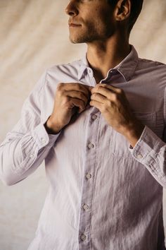 We’ve taken your everyday office friendly work shirt up a notch or five. This ultra soft shirt is made from a double gauze 100% organic cotton giving it a nice natural soft texture. Reinforced with thick durable buttons - trust us, you won’t be losing any of these, It’s the perfect length leaving you the option to tuck in or not. From your weekend getaway to client meetings, the Ripper shirt is a true multi-purpose champ giving you the perfect blend of sophistication and comfort. Purple Shirt With Relaxed Fit And Buttons, Purple Shirt With Buttons And Relaxed Fit, Casual Long Sleeve Lavender Shirt, Purple Cotton Shirt With Pockets, Purple Relaxed Fit Shirt With Buttons, Relaxed Fit Lavender Cotton Shirt, Lavender Long Sleeve Shirt For Work, Business Casual Purple Cotton Shirt, Purple Cotton Business Casual Shirt