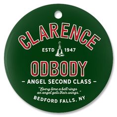 a round green ornament with the name of an old school class