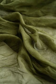 a close up view of a green cloth