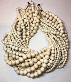 "16\" full strand of natural White wood beads. Made in the Philippines. They are round in shape but not perfectly round. The beads on each strand are uniform. Hole sizes: 5mm - 1mm 6mm - 1mm 8mm - 2mm 10mm - 3mm Find more natural bead strands here: https://www.etsy.com/shop/thebeadgalleryA2 Processing time: 1-3 days Shipping: 2-5 days standard USPS shipping methods" Natural Color Hand-strung Beaded Necklaces With Round Beads, Natural Hand-strung Beaded Necklace With Round Beads, Natural Hand-strung Round Beaded Necklaces, Natural Hand-strung Beaded Necklace, Natural Beaded Necklaces With Round Beads, Natural Round Beaded Necklaces, Natural Wooden Beads Necklace, Natural Wood Jewelry With Round Wooden Beads, Natural Wood Color Jewelry With Round Wooden Beads