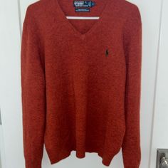 Beautiful Men's Polo Rl Lambswool V-Neck Sweater New Without Tags Sz L 100% Lambswool In An Awesome Rare Marled Burnt Orange Color With A Dark Green Pony All Measurements Are Approximate And Taken Across In Inches Length: 26 Top Of Shoulder To Hem Chest: 22.75 Across Underarms Questions? Please Message Me From A Clean, Smoke Free Home Wool V-neck Polo Sweater For Fall, Casual Wool V-neck Top, Orange V-neck Sweater For Fall, Burnt Orange Long Sleeve Winter Sweater, Casual Wool Polo Sweater With V-neck, Casual Wool V-neck Polo Sweater, Polo Ralph Lauren Sweater, Burnt Orange Color, Ralph Lauren Sweater