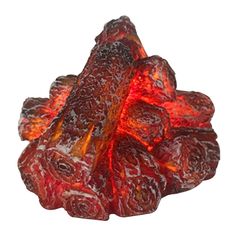 red glass figurine sitting on top of a white surface with flames coming out of it