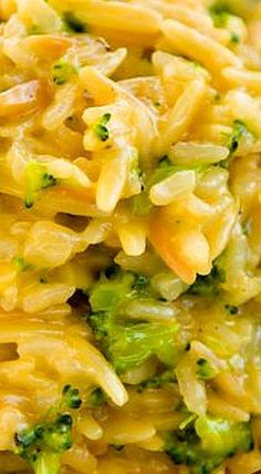 pasta with broccoli and cheese is piled high on top of each other in a bowl