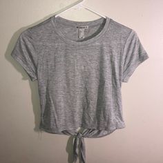 Women’s Crop Top Tee In A Size Medium - Heather Grey - Small Fit - New/Tags/Good Condition - Open Back - Ties At Bottom - Very Light Material - Super Cute And Comfy ! Forever 21 Casual Crew Neck Crop Top, Casual Forever 21 Crew Neck Crop Top, Casual Fitted Tops From Forever 21, Forever 21 Casual Crop Top For Day Out, Casual Gray Crop Top For Spring, Basic Gray Crop Top For Spring, Cropped Polo Shirt, Plus Size Crop Tops, White Lace Crop Top