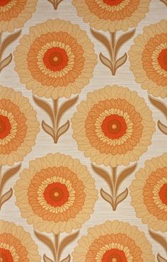 an orange and brown flower pattern on a white background