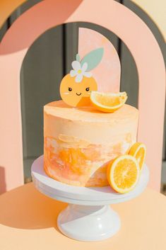 there is a cake with orange slices on it