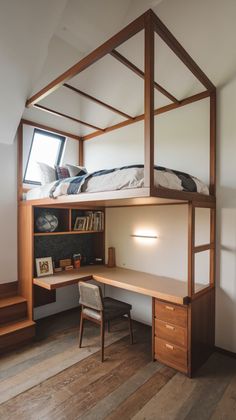 a loft bed with desk underneath it and stairs leading up to the upper floor area