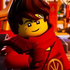 the lego movie character is wearing a red coat