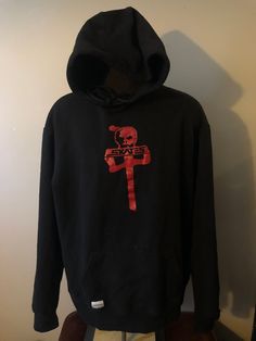 "Crossover skateboard hoodie  - Rare collaboration  - Red Dragon x Skull Skates crossover  - RDS big logo  - Skull Skates big logo  - Hybrid logo design  - Sleeve hit w/ hybrid logo  - Thrashed vintage condition  - Some tear along cuff line  - Minor bleaching speckles in areas  - Hard to find sizing  Size: 3XL 27\" pit to pit  30\" shoulder to waist  Great distressed vintage condition  Small tear and minor bleach areas  DM for more information or additional pics" My Chemical Romance Hoodie, Dolly Parton Shirt, Iron Maiden Shirt, Red Dragon, Crossover, Skateboard, Sweat Shirt, Logo Design, Sweatshirts Hoodie