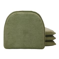 three pieces of green fabric sitting on top of each other