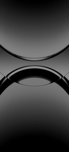 an abstract black and white photo with curved lines