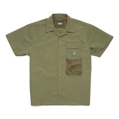 A layerable tech shirt with ample stash pockets for foraging Khaki Camp Shirt With Pockets For Outdoor, Outdoor Khaki Camp Shirt With Pockets, Cotton Camp Shirt With Pockets For Outdoor Activities, Functional Outdoor Tops With Side Pockets, Green Shirt With Pockets For Outdoor Activities, Relaxed Fit Tops With Cargo Pockets For Outdoor, Utility Tops With Side Pockets For Outdoor, Outdoor Top With Pockets And Camp Collar, Green Outdoor Shirt With Pockets