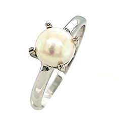 A 6.8mm freshwater cultured pearl set in a simple 4-prong 14kt white gold setting.Size 7.5***Note: Most Heritage Collection rings can be sized, and a complimentary sizing is included up to one full size up or down. For further sizing needs, please contact us before making a purchase. *** Luxury Classic Pearl Ring With Prong Setting, Pearl Set, Heritage Collection, Pearl Ring, Bridal Style, You Bag, Fresh Water, Size 7, White Gold