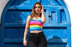 This bright and bold rainbow stripe women's cropped tank top is so very colourful and happy, made with my funky rainbow stripe design which is printed on a smooth stretch fabric. This is the rainbow of all rainbow tops to make a statement, and spread some love and colour. Whether you are going to yoga, a festival, clubbing, the gym, pride, or dancing in your living room, this rainbow vest top is make you smile from withinbecause life is too short to wear boring clothes...right!! This rainbow ves Rainbow Vest, Rainbow Top, Boring Clothes, Cropped Tube Top, Striped Crop Top, Rainbow Stripes, Vest Top, Cropped Tank Top, Stripes Design