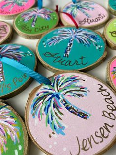 decorated wooden slices with names and fireworks on them