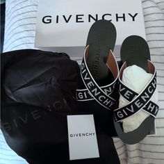 Black Leather Sandals By Givenchy. Logo On The Sole And Straps. Low, Flat Heels With Fabric Straps. Made In Italy. Brand New In Original Box. Size 36. Designer Black Sandals With Single Toe Strap, Flat Heels, Givenchy Shoes, Givenchy Logo, Black Leather Sandals, Women's Shoes Sandals, Leather Sandals, Givenchy, Original Box