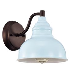 a wall light with a blue shade on it's side and an arm that is attached