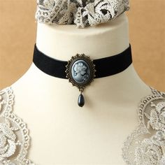 Our Victorian Choker : Timeless Elegance Have you ever dreamed of wearing a jewelry piece that celebrates your femininity while staying true to a timeless style? The Victorian Choker necklace is the answer to your dreams. Don't wait any longer to add this steampunk choker necklace to your jewelry collection. Order today and enjoy fast and free shipping as well as a 100% satisfaction guarantee! More about the choker: Total length 14 inches |36 cm Style: Neo-Gothic Material: velvet, zinc alloy Loo Victorian Choker Necklace, Cameo Choker, Steampunk Choker, Black Cameo, Victorian Accessories, Vintage Choker Necklace, Velvet Choker Necklaces, Gothic Chokers, Black Velvet Choker