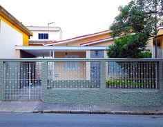 a fenced in area next to a building