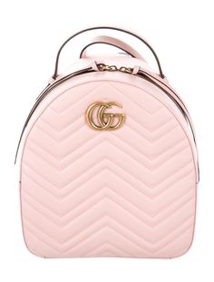 #GUCCI | From Current Collection. Pale pink matelassé leather Gucci Marmont backpack with gold-tone hardware, running GG embellishment at front, dual adjustable shoulder straps, single flat top handle, blush suede lining, three pockets at interior walls and two-way zip closure at top. Includes dust bag. Shop authentic designer handbags by Gucci at The RealReal. Gucci Gg Marmont Matelasse, Gucci Marmont, Western Purses, Gucci Gg Marmont, Purses Designer, Designer Handbags, Handbag Backpack