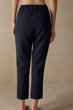 Full-length trousers featuring two pockets, faux back pocket and covered elasticated waist. Elegant Ankle-length Bottoms With Pull-on Style, Elegant Blue Pants With Elastic Waistband, Elegant Ankle-length Pants With Pull-on Style, Elegant Straight Pants With Side Pockets, Elegant Ankle-length Pull-on Bottoms, Elegant Long Pants With Pockets, Elegant Ankle-length Pull-on Pants, Elegant Tapered Leg Pull-on Pants, May I Help You