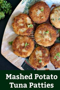 mashed potato tuna patties on a plate with parsley