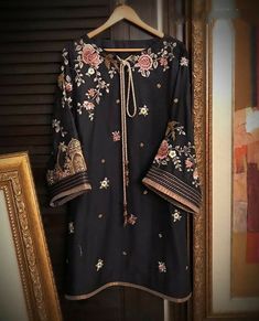 ✨This Black elegant embroidered kurti is perfect for any party or formal occasions. This is only kurti there is no bottom with this dress.It has beautiful resham thread embroidery all over the front and sleeves. ✨We stitched outfit with lot of care, so that our customers should not have any issues regarding finishing and fitting. ✨This dress can be customise in any other colour and in all size, please contact us regarding any changes if you want.We will make this dress as per your choice. ✨Pleas Elegant Embroidered Lawn Suit For Navratri, Eid Tunic Kurta With Intricate Embroidery, Party Cambric Kurta With Dabka Detailing, Designer Cambric Kurta With Intricate Embroidery, Eid Kurta With Intricate Embroidery, Elegant Shantoon Kurta For Navratri, Designer Embroidered Tunic Salwar Kameez, Designer Embroidered Salwar Kameez Tunic, Cambric Straight Kurta For Party