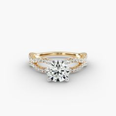 a gold and white diamond engagement ring